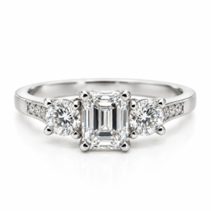 0.84ct Emerald and Round Brilliant Cut Diamond Trilogy Ring