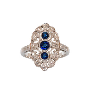 0.56ct Round Sapphire & Round Brilliant Cut Diamond Cluster Ring