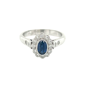 0.64ct Oval Sapphire & Round Brilliant Cut Diamond Cluster Ring