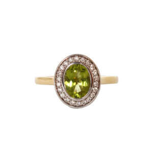 Oval Peridot & Round Brilliant Cut Diamond Cluster Ring