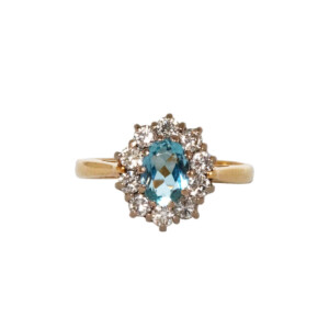 0.60ct Oval Aquamarine & Round Brilliant Cut Diamond Cluster Ring